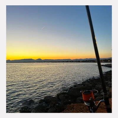 Canne à pêche et coucher de soleil / A rod and a sunset